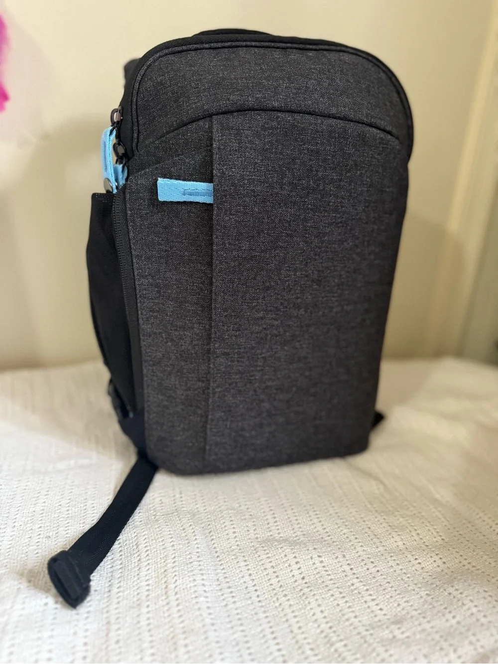 Men's Compact Black Sling Bag with Light Blue Accents